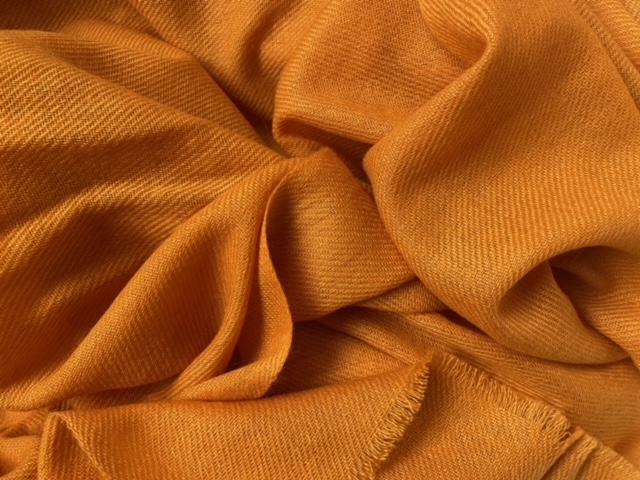 Cashmere stole in warm orange